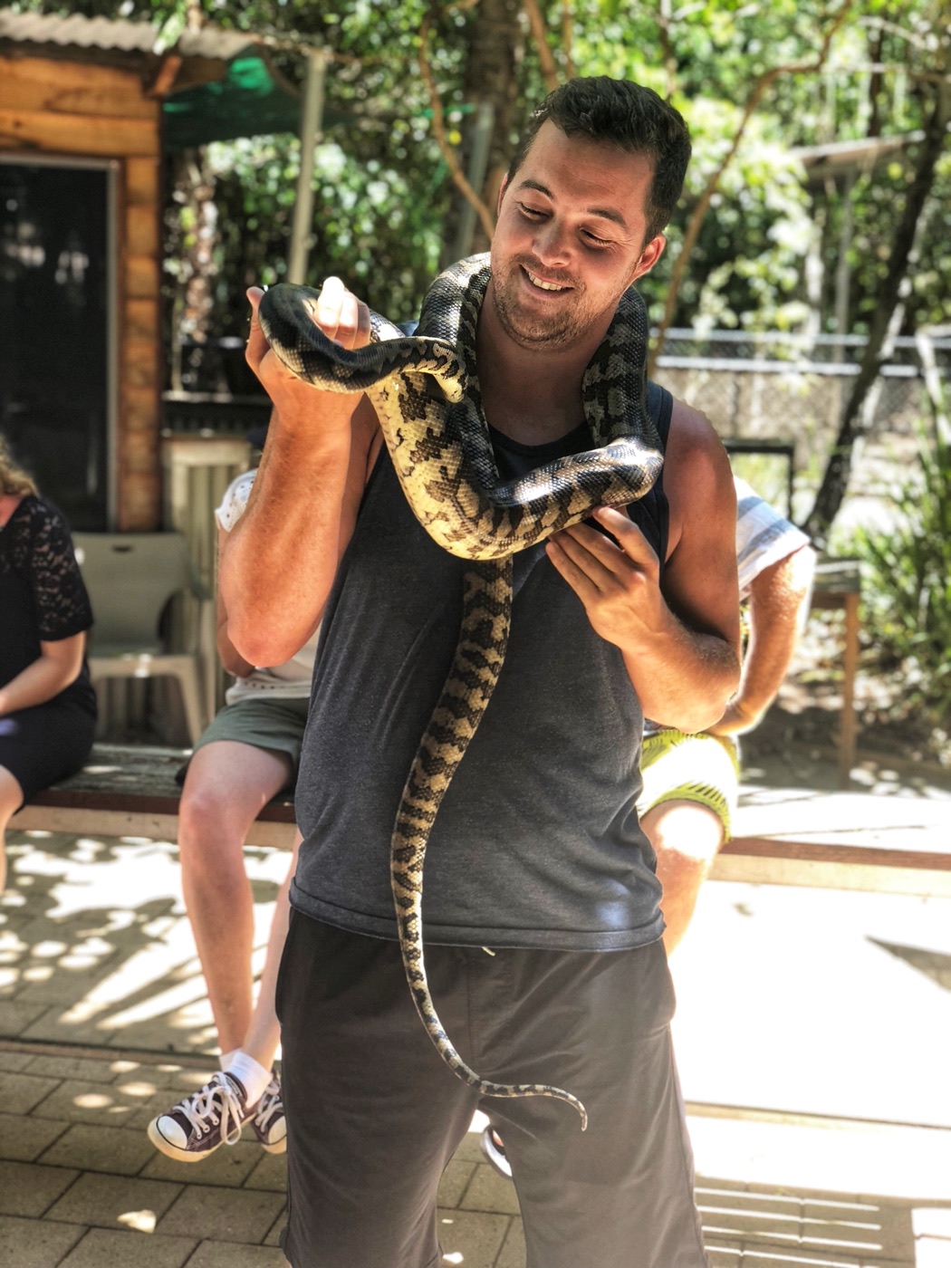 Mike holding a python in Queensland