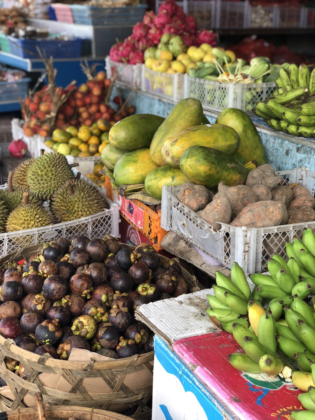 Durian, mangosteen, papaya, and bananas at a Bali market